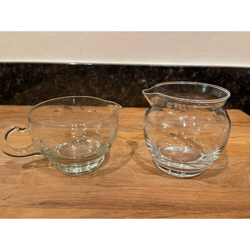2 princess house creamers.